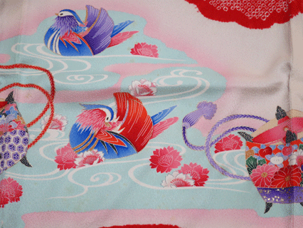 茶色シミを除去した宮参り掛け着。